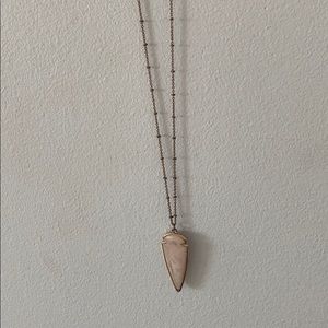 Long pendant necklace with light pink pendant